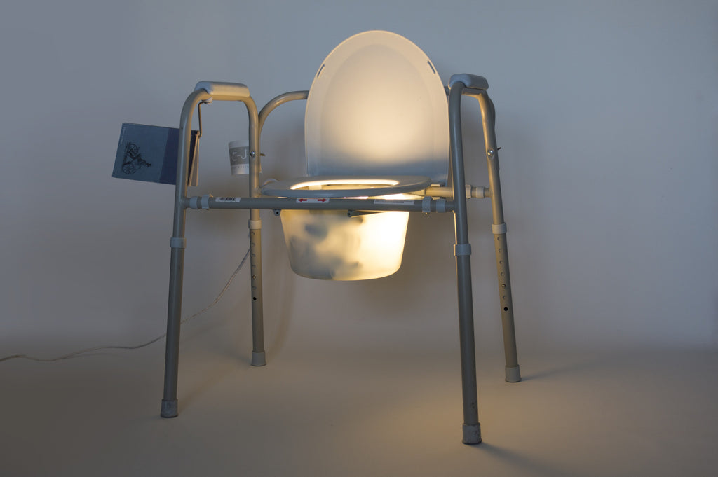 Commode: Reading Chair And Lamp